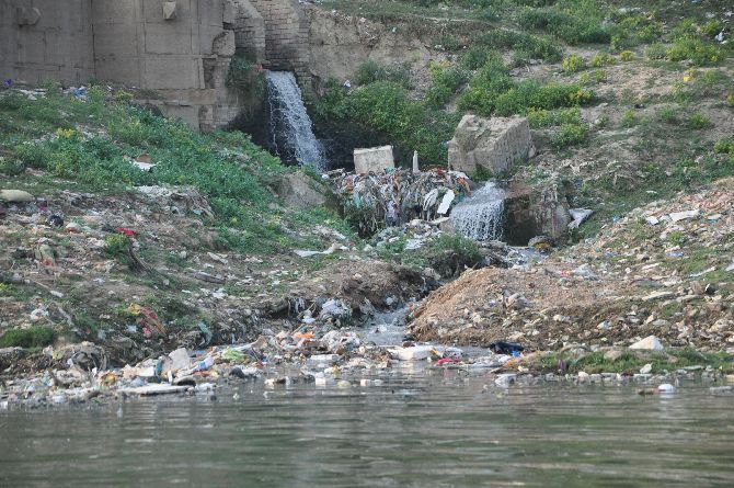 Sewage and effluents flow unchecked into the river