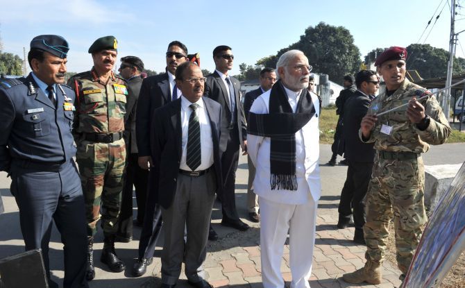 Prime Minister Narendra Modi with Air Chief Marshal Arup Raha, General Dalbir Singh and National Security Adviser Ajit Doval at the Pathankot airbase, January 9. Photograph: Press Information Bureau