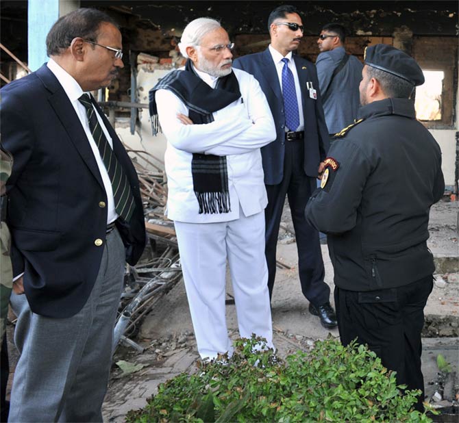 Prime Minister Narendra Modi and National Security Adviser Ajit Doval at the scene of the encounter with the terrorists at the Indian Air Force base in Pathankot January 9. Photograph: Press Information Bureau