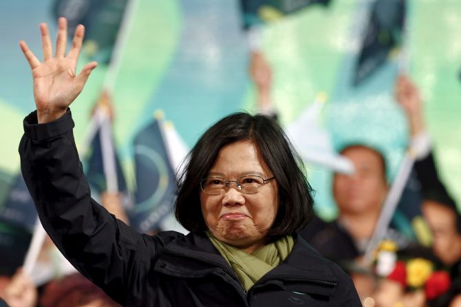 Democratic Progressive Party Chairperson and Taiwan's President Tsai Ing-wen greets supporters after her victory at party headquarters in Taipei. Photograph: Pichi Chuang/Reuters