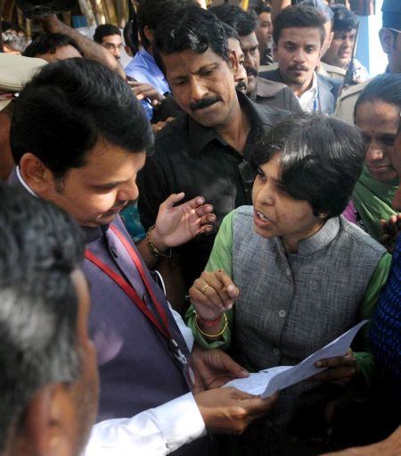 Trupti Desai meets Maharashtra Chief Minister Devendra Fadnavis in Pune. Photograph: PTI