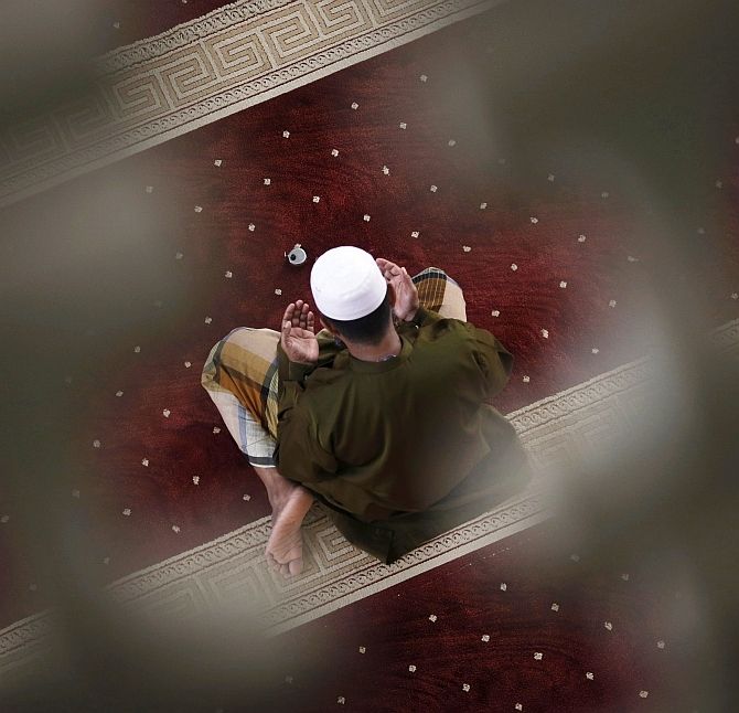 A Muslim youth prays