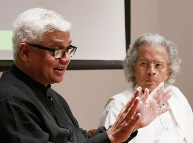 Anil Dharker listens attentively as Amitav Ghosh makes a point.