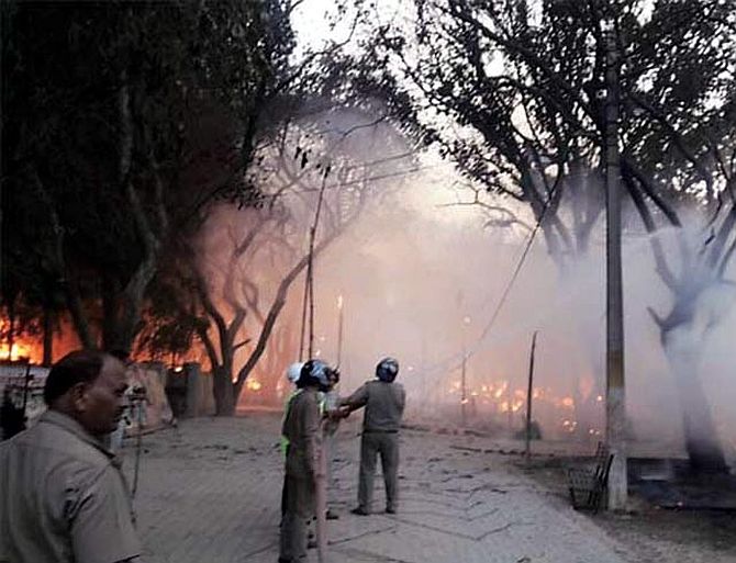 The police opened fire after using lathis and tear gas at the murderous encroachers. Photograph: Sandeep Pal