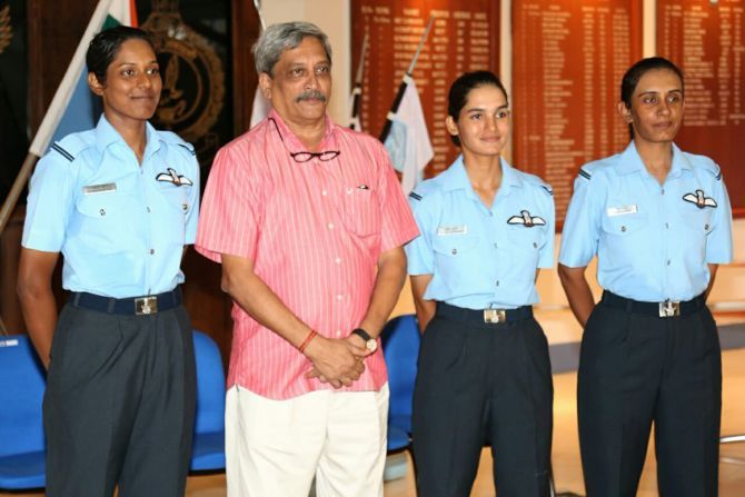 Avani Chaturvedi, Bhawana Kanth and Mohana Singh, the IAF's first women fighter pilots, with Defence Minister Manohar Parrikar