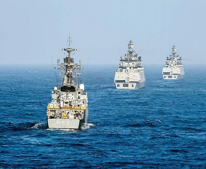 The Indian Navy Kora-class corvette INS Kirch and Shivalik-class stealth multi-role frigates INS Sahyadri and INS Satpura conduct a live-fire surface gun exercise during Malabar 2016. Photograph: Petty Officer 2nd Class Ryan Batchelder/US Navy