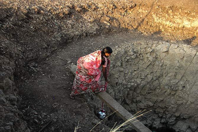 Nandu Jadhav is a good swimmer and a regular at the well. This well is her village's only source of water and she and her children regularly visited the well.