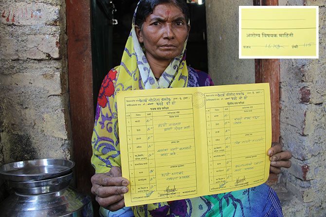 Yogita's aunt shows her report card. Her father couldn't control her emotions as he saw the report card again.