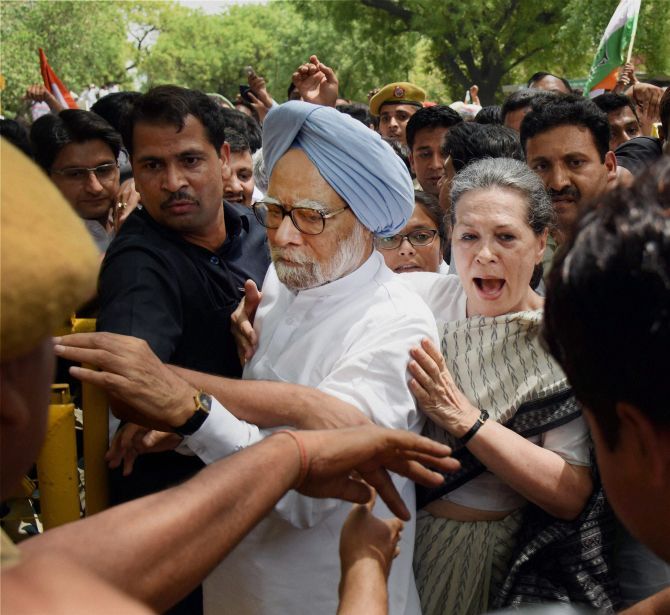 Congress President Sonia Gandhi and former prime minister Dr Manmohan Singh court arrest during the 'Save Democracy' march in New Delhi, May 6, 2016. Photograph: Shirish Shete/PTI Photo