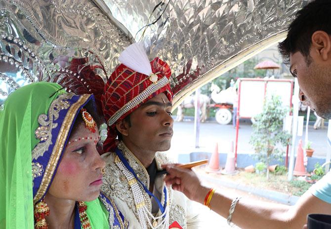 A groom gets a quick touch-up.