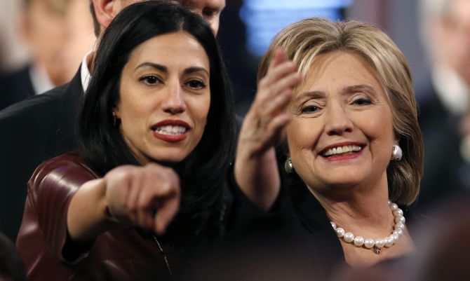 Huma Abedin with Hillary Clinton at the second Democratic presidential candidates debate in Des Moines, Iowa, November 14, 2015. Photograph: Jim Young/Reuters