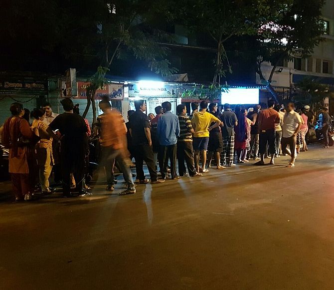 : People queue up outside an ATM in Mumbai. Photograph: Vedant Kotian for <em>Rediff.com</em>