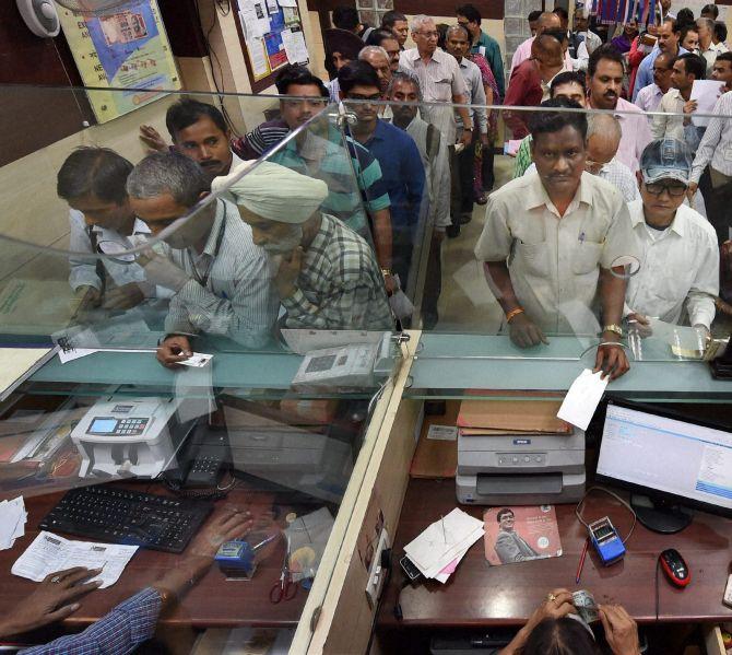 People line up inside a bank to deposit their Rs 500 and Rs 1000 notes after the PM demonetised it on Tuesday night. Photograph: Vijay Verma/PTI Photos