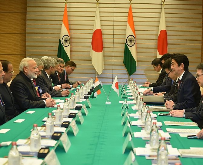 Prime Minister Narendra Modi and Japan Prime Minister Shinzo Abe with their respective delegations.