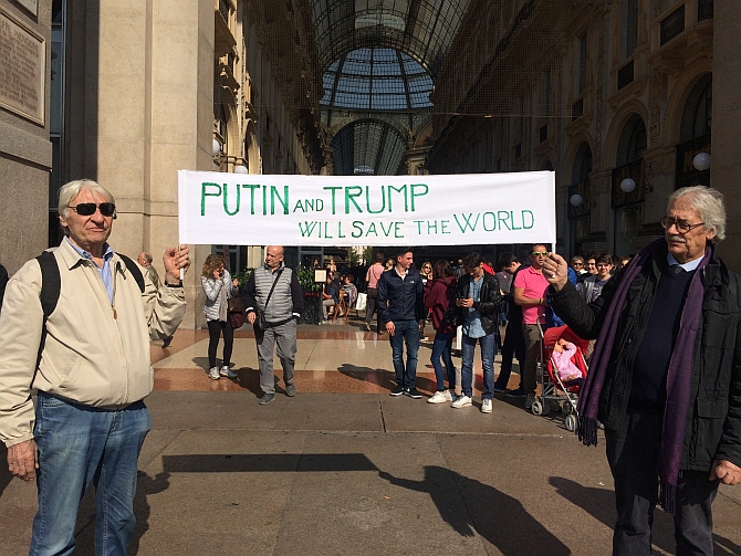 Vladimir Putin and Donald Trump supporters in Milan, Italy. Photograph: Vittorio Zunino Celotto/Getty Images