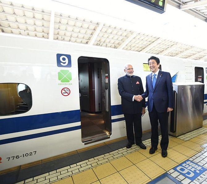 Prime Minister Narendra D Modi and Japanese Prime Minister Shinzo Abe travelled in Japan's famed high-speed Shinkansen bullet train, November 12, 2016. Modi and Abe travelled in the train, whose speed ranges from 240 kms per hour to 320 kms per hour, from Tokyo to Kobe. Photograph: MEASpokesman/Twitter