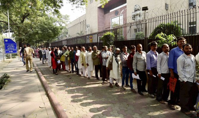 Indians wait in a long queue outside the Reserve Bank of India in New Delhi, November 13, 2016. Photograph: Kamal Singh/PTI Photo