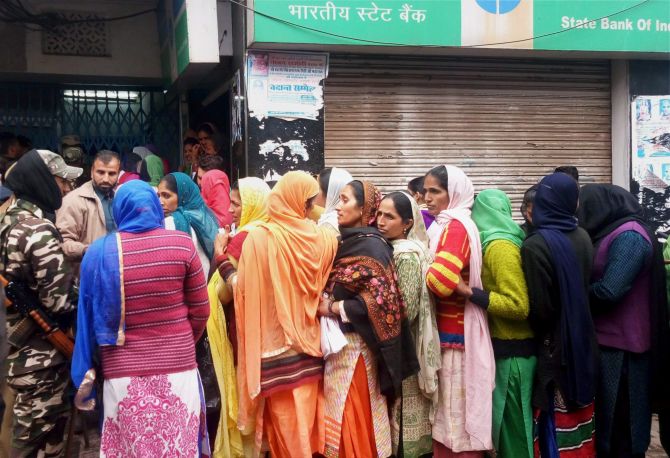 RAJOURI: A queue outside the State Bank of India. Photograph: PTI Photo