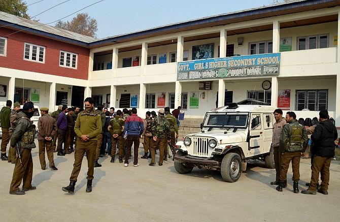 Security personnel outside a school in the Kashmir Valley, to ensure there were no disruptions while the examination was in progress.