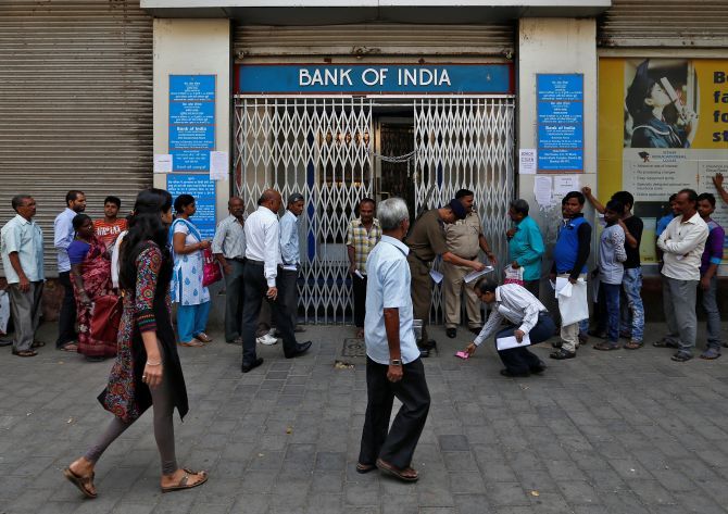 The queue outside a bank in Mumbai. Photograph: Saahil Salvi