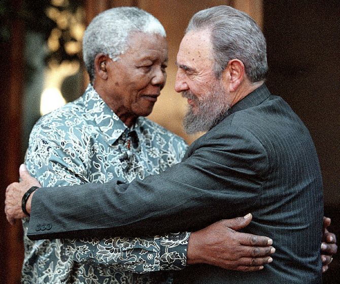 With Nelson Mandela in Houghton, Johannesburg, in 2001. Photograph: Chris Kotze/Reuters