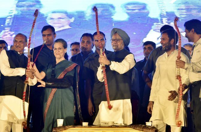 Congress President Sonia Gandhi, former PM Manmohan Singh and Congress vice-president Rahul Gandhi at the Nav Shri Dharmic Leela Committee's Dussehra celebrations at the Red Fort Ground in New Delhi, October 11, 2016. Photograph: Kamal Singh/PTI Photo