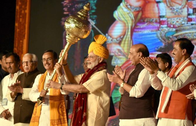 Prime Minister Narendra Modi with a mace at the Aishbagh Ramleela in Lucknow, October 11, 2016, marking the beginning of what observers say is the Bharatiya Janata Party's election campaign for the 2017 Uttar Pradesh assembly election. Photograph: Press Information Bureau