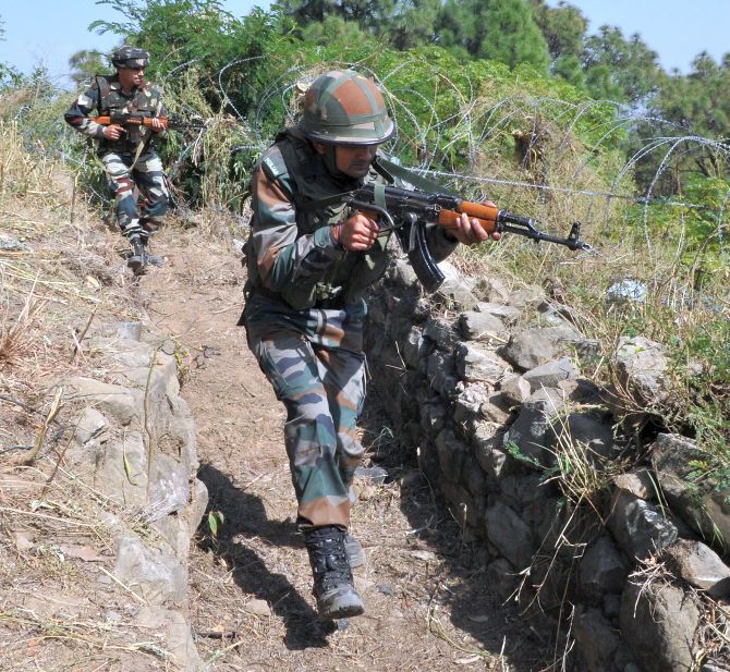 Indian soldiers on a search operation near the Line of Control in Jammu and Kashmir