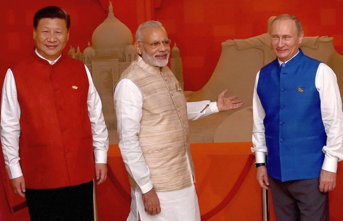 Prime Minister Narendra Modi with Russian President Vladmir Putin at the BRICS summit in Goa, October 15, 2016. On the left is the President of Pakistan's 'all weather' friend, China, Xi Jinping.