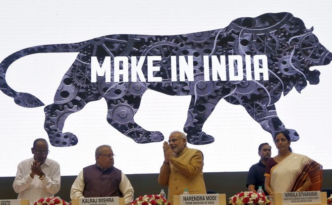 PM Narendra Modi with Nirmala Sitharaman during the launch of 'Make in India' campaign by Modi in New Delhi. Photograph: Adnan Abidi/Reuters