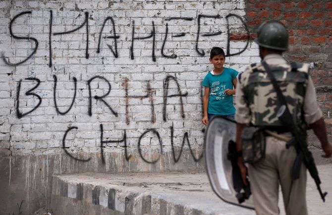 A wall painted with graffiti during a protest in Srinagar, September 2016. Photograph: Danish Ismail/Reuters
