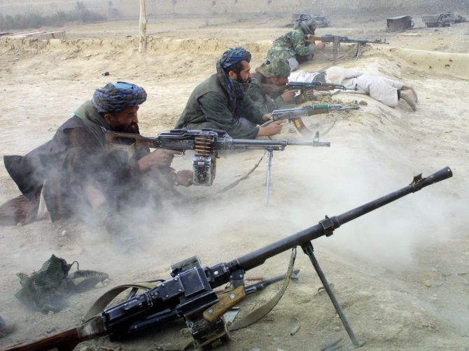 Ahmad Shah Massoud's Northern Alliance fighters near Mazar-e-Sharif, Afghanistan in 2001. Photograph: Oleg Nikishin/Getty Images