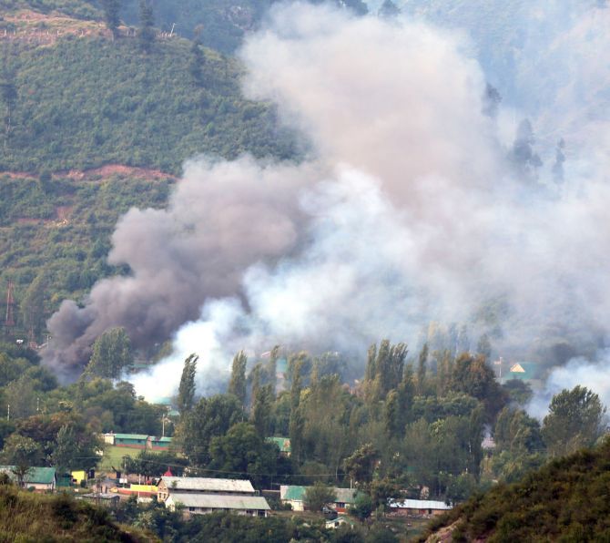 Smoke rises from the Uri Brigade camp during the September 18, 2016 terror attack. Photograph: Umar Ganie
