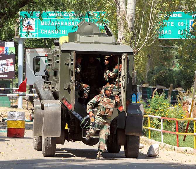 Indian soldiers arrive at the Uri army brigade headquarters after the terror attack, September 18, 2016. Photograph: Umar Ganie