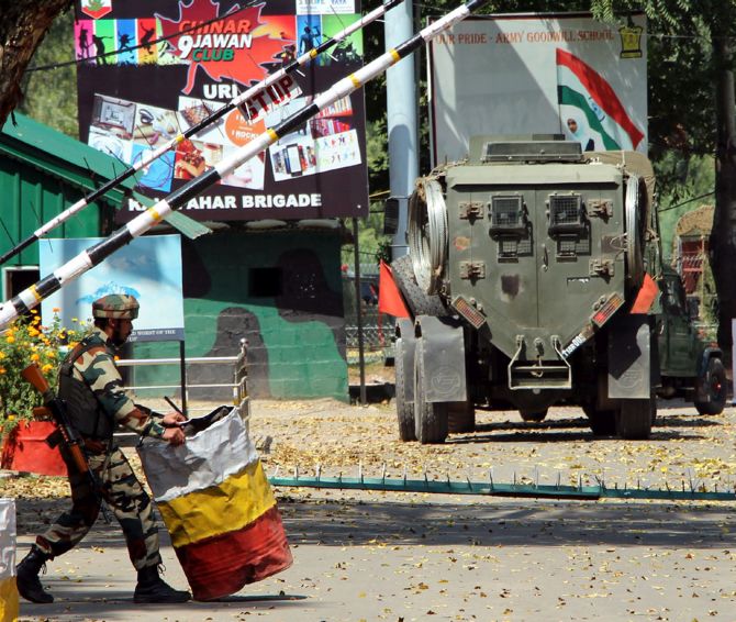 Soldiers on their way to neutralise the terrorists at the army camp in Uri, September 18, 2016. Photograph: Umar Ganie