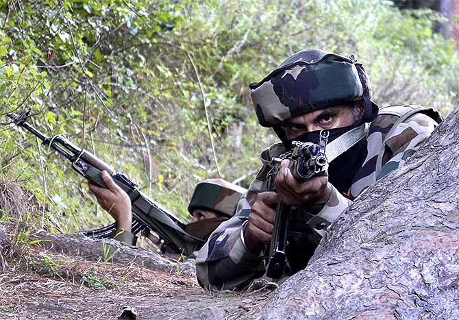 Soldiers search for terrorists in Lachipora in Uri. Photograph: Umar Ganie
