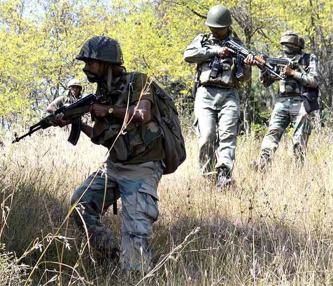 Soldiers search for terrorists in Lachipora in Uri. Photograph: Umar Ganie