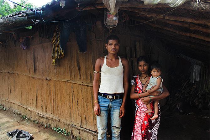 The Waghs outside their house at Kalamwadi, a small tribal hamlet, with around 30-odd houses. Unlike, Petranjani, Kalamwadi residents are beneficiaries of metered electricity.