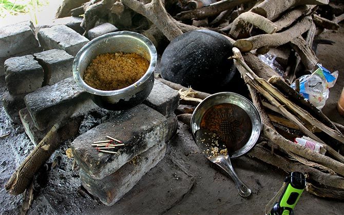 This was the Savar family's lunch for the day. It was only after lot of persuasion and requests Tara, Mamta's sister-in-law, agreed to remove the lid off the soot-laden vessel.