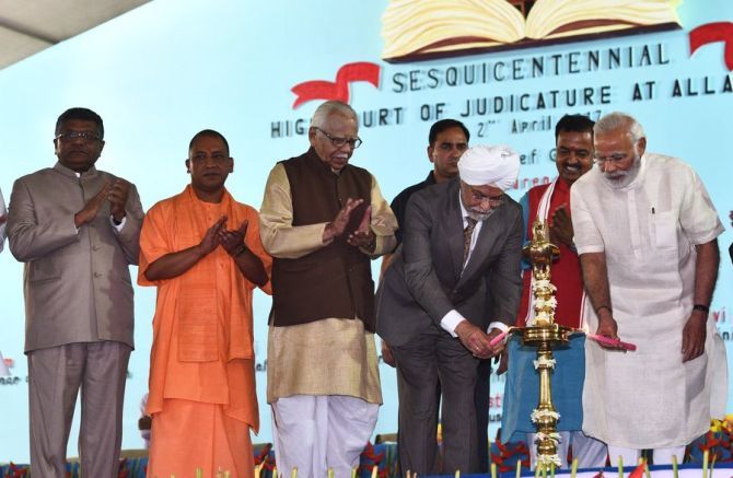 Prime Minister Narendra D Modi and then Chief Justice of India Justice J S Khehar inaugurate the sesquicentennial celebrations marking 150 years of the Allahabad high court in Allahabad, April 2, 2017. Also seen are Uttar Pradesh Governor Ram Naik, Chief Minister Yogi Adityanath, Union Law Minister Ravi Shankar Prasad and Deputy CM Keshav Prasad Maurya. Photograph: @PMOIndia/Twitter