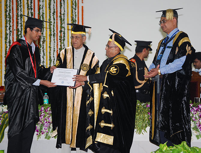 President Pranab Mukherjee, the chief guest, at IIT-Kanpur's 45th convocation presents a degree to an IIT topper, July 5, 2013. Image only published for representational purposes. Photograph: Kind courtesy IIT-Kanpur