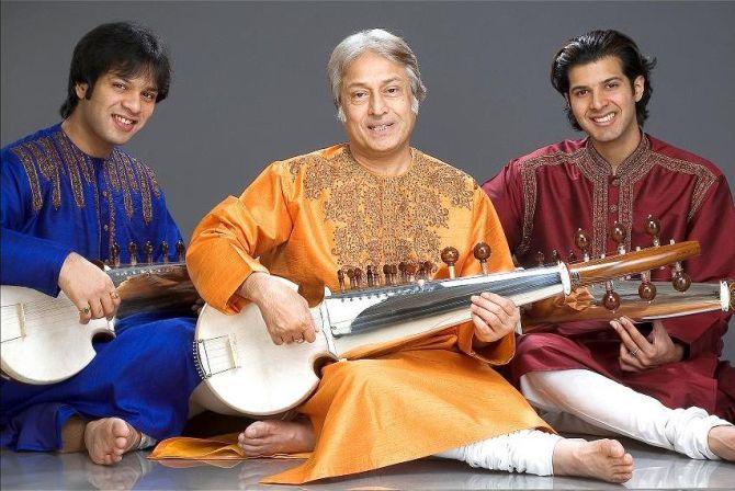 Amaan and Ayaan Ali Bangash with their father, Ustad Amjad Ali Khan