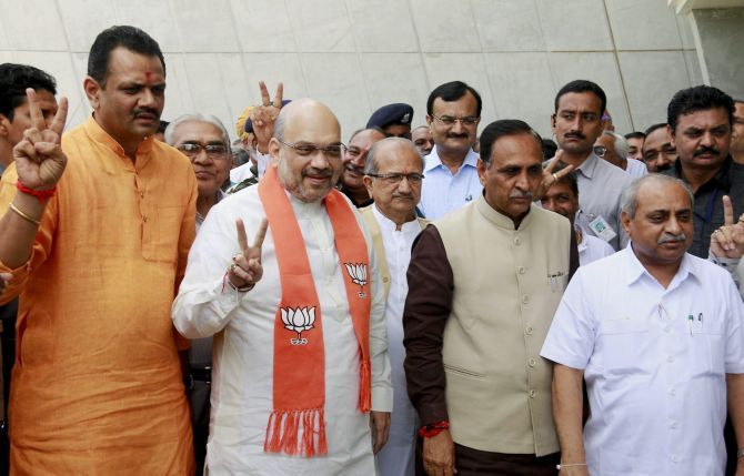 From left, BJP Gujarat President Jitu Vaghani, BJP national President Amit Shah, Gujarat Chief Minister Vijay Rupani and Deputy Chief Minister Nitin Patel, August 9, 2017. Photograph: PTI Photo