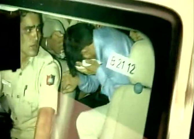 Vikas Barala and Ashish Kumar, accused of stalking Chandigarh DJ Varnika Kundu, being taken to jail, August 9, 2017. Photograph: ANI