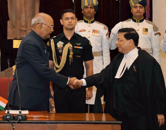 Justice Dipak Misra is sworn in as the 45th Chief Justice of India by President Ram Nath Kovind at Rashtrapati Bhavan, August 28, 2017.  Photograph: @rashtrapatibhvn/Twitter