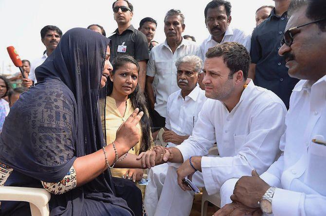 Rahul Gandhi meets with the families of fishermen affected by Cyclone Ockhi in Kanyakumari, December 14, 2017. Photograph: PTI Photo