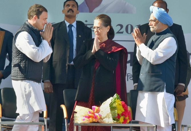 December 16, 2017: Rahul Gandhi greets outgoing Congress president Sonia Gandhi and former PM Dr Manmohan Singh after taking over as Congress president. Photograph: Vijay Verma/PTI Photo