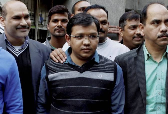 Anubhav Mittal, centre, known for his flashy lifestyle, was arrested by the UP STF, as the kingpin of the Rs 3,700 crore online ponzi scam