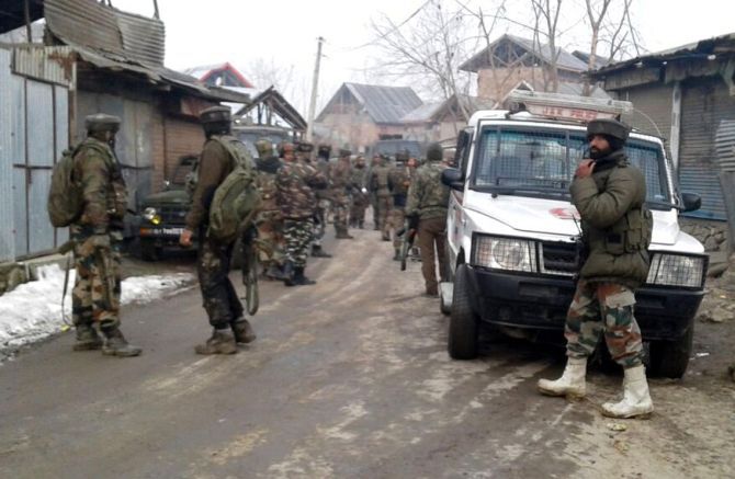 Soldiers at the venue of an encounter in Kralgund, Kupwara, north Kashmir, February 14, 2017. Four soldiers including a major were killed in the firefight in which four terrorists died. Photograph: Umar Ganie