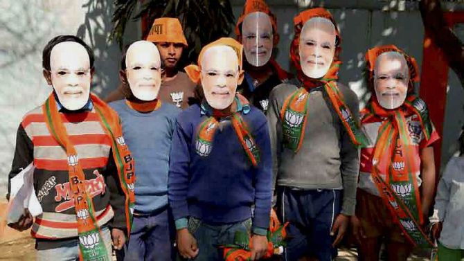 boys with Narendra Modi masks in Allahabad
